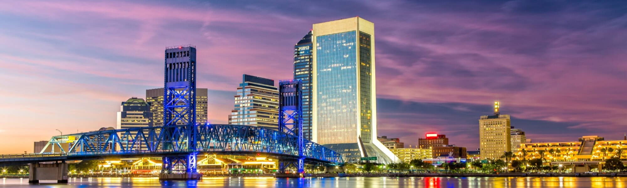 Skyline of Jacksonville, FL and Main Street Bridge at Dusk